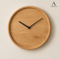 Round wooden wall clock with ARMST logo