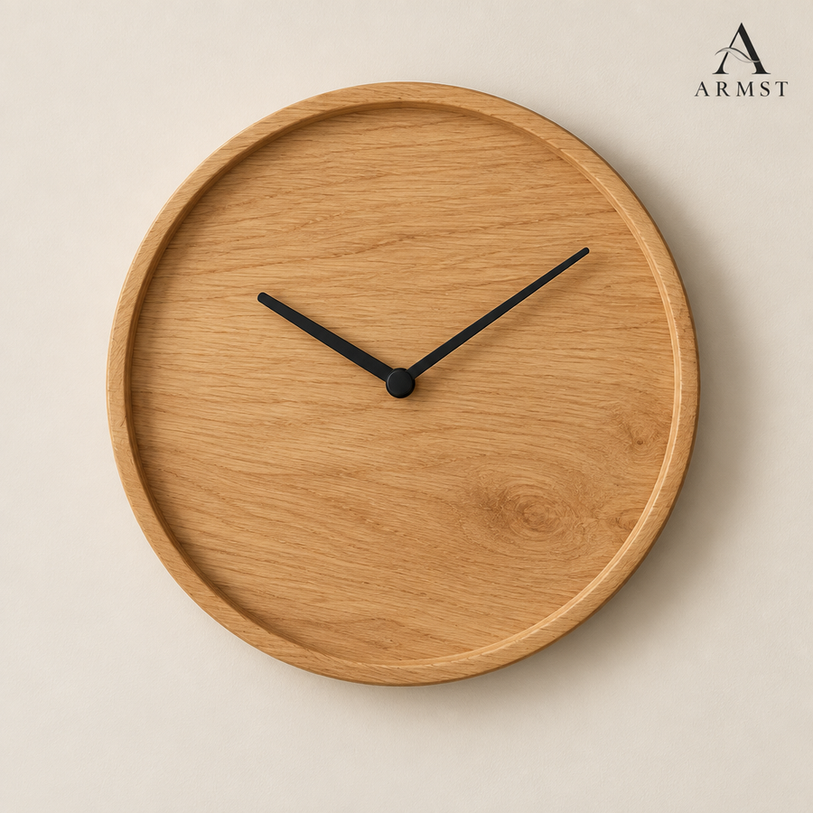 Round wooden wall clock with ARMST logo