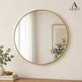 Decorative round wall mirror with ARMST logo