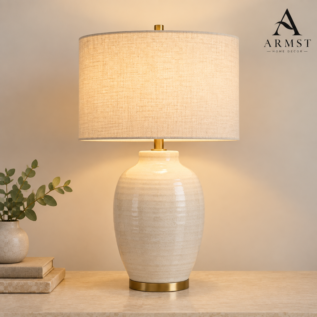 Ceramic base table lamp with ARMST logo